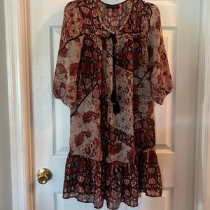 NWT. Very cute BoHo dress. Petty fall colors. Size 6.